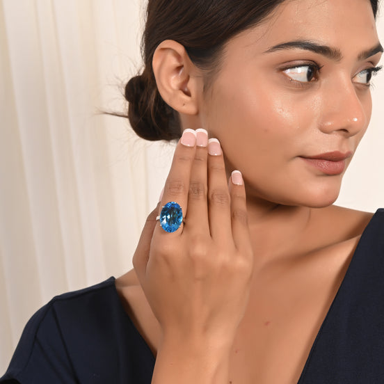Serene Blue Topaz Solitaire Ring