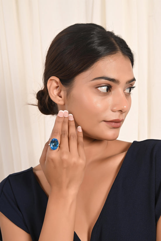 Serene Blue Topaz Solitaire Ring